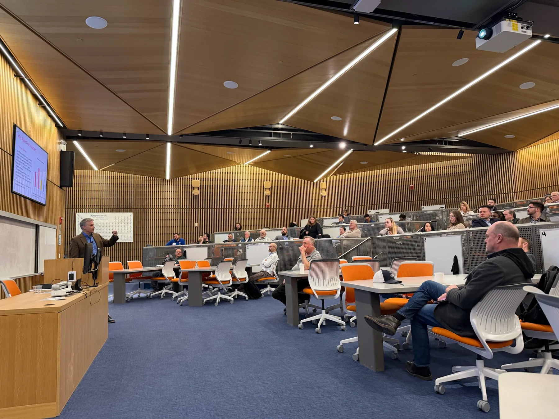 Audience during faculty talks in Science 1's G01 active learning room