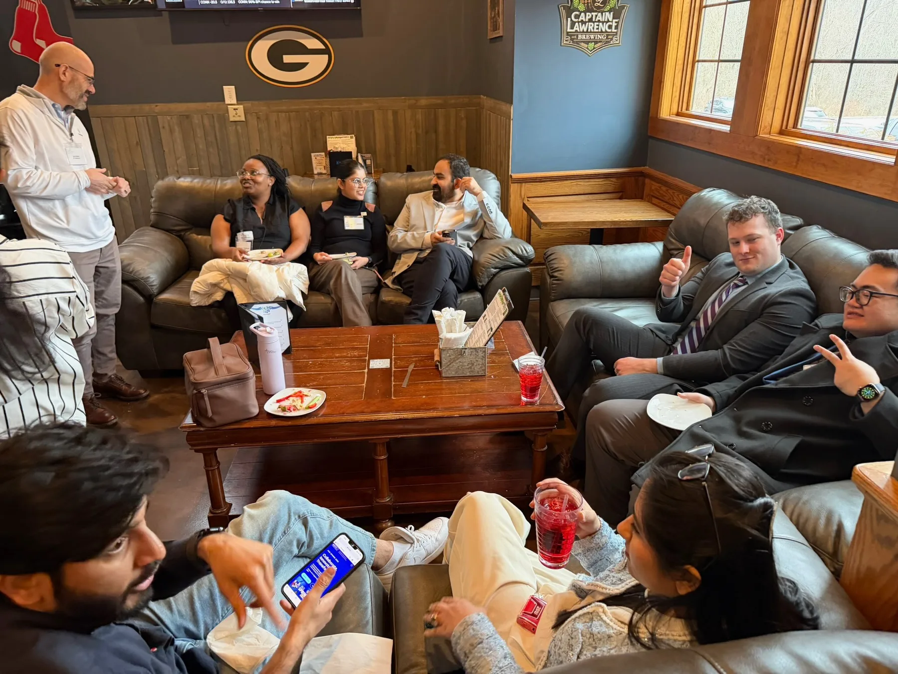 UConn students networking at Hops 44